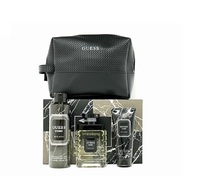 Guess Uomo /мъжки/ Комплект - Тоалетна вода 100 ml + Дезодорант спрей 226 ml + Душ гел 100 ml + чантичка